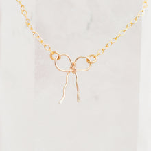 Load image into Gallery viewer, BOW NECKLACE - SILVER + GOLD
