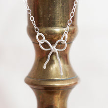 Load image into Gallery viewer, BOW NECKLACE - SILVER + GOLD
